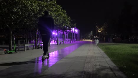 man riding scooter