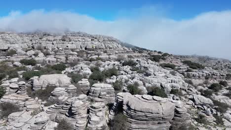 flying with a drone through the natural area of ​​el torcal, a karst area located in antequera in the province of malaga, spain