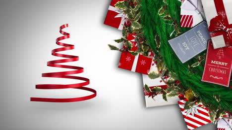 animación digital de la cinta que forma un árbol de navidad y regalos y tarjetas de navidad