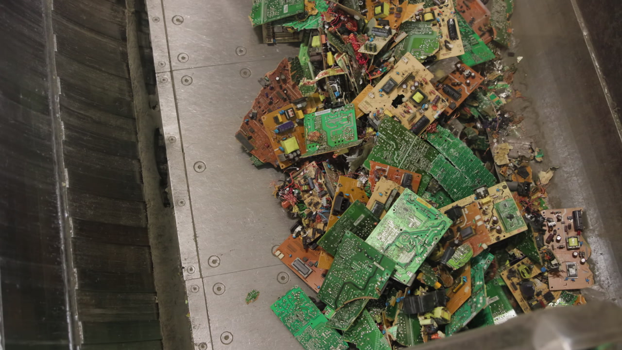 Overhead View Conveyor Of Circuit Boards In Metal Trough During Bulk Processing, Mixed Green PCBs . Media