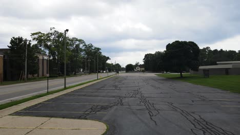 Rise-and-tilt-over-stormy-parking-lot