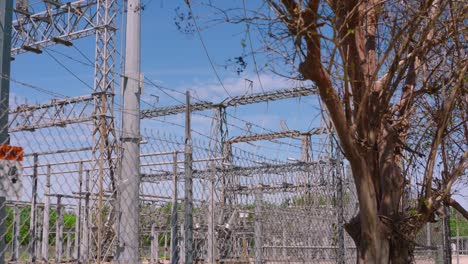 Low-angle-view-looking-up-at-power-grid-and-power-lines