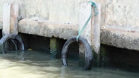 canal with tires and life rings visible