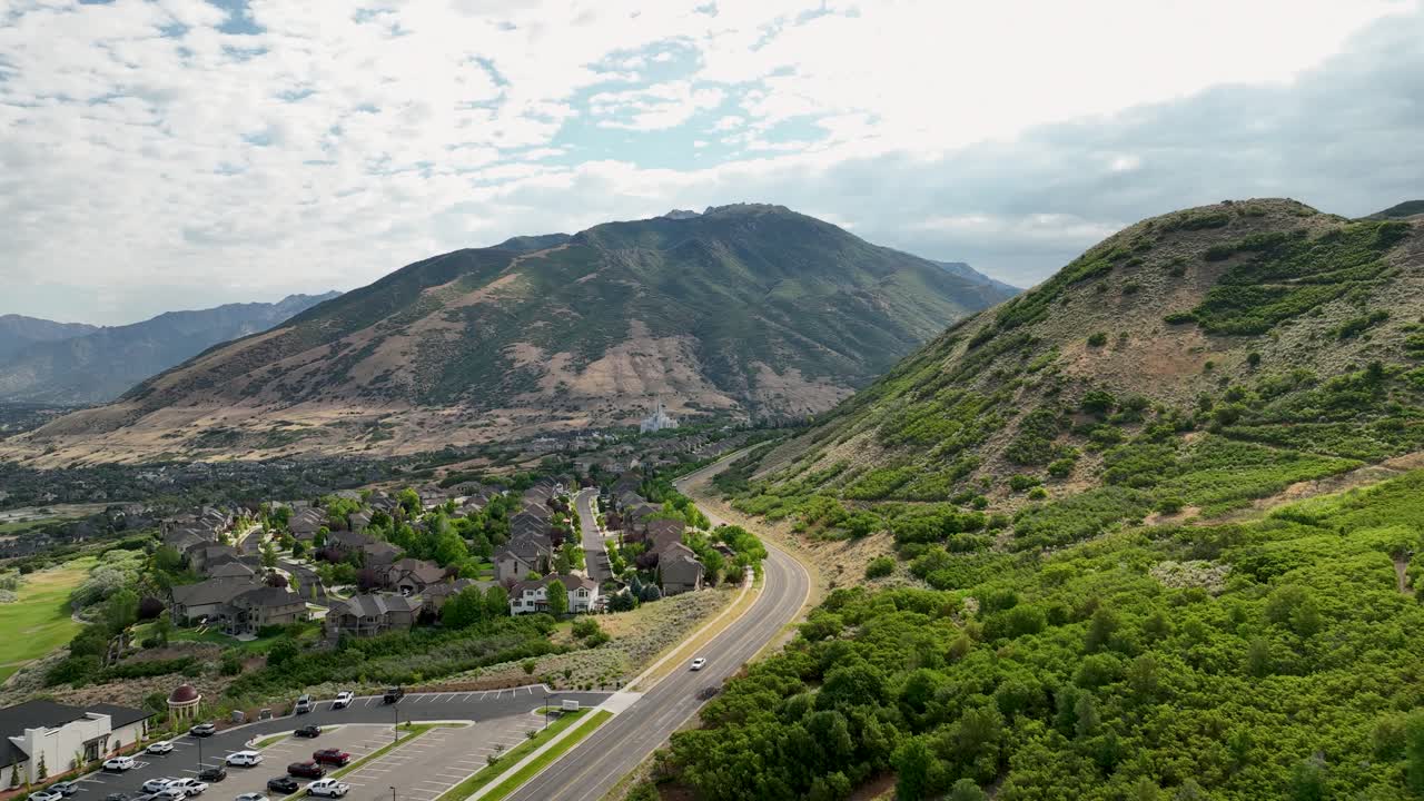 Draper, Utah flying over Mike Weir Drive towards the east mountains neighborhood and LDS Temple