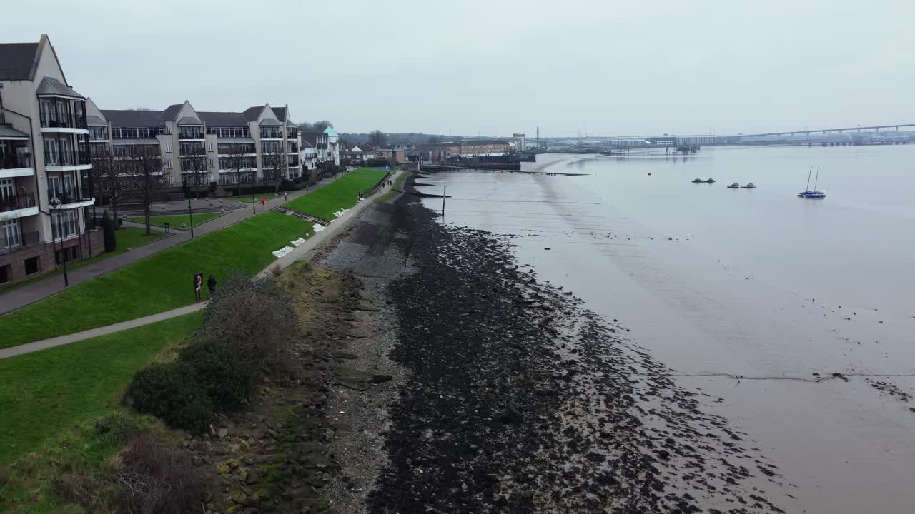 Coastal View with Buildings and a Bridge