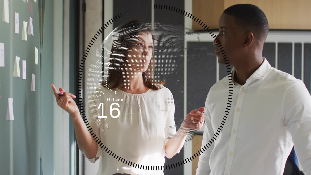 Woman tapping notes with pink pen, activating AR HUD while colleague watching, planning business