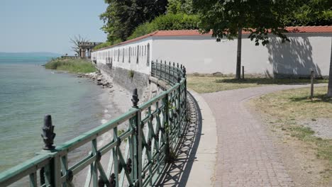 people sightseeing at lake constance bodensee near city of friedrichshafen, germany