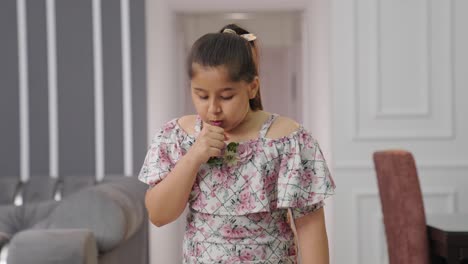 sick indian kid girl coughing and not feeling well