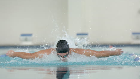 water splashing in swimming pool, capturing dynamic movement and energy, copy space