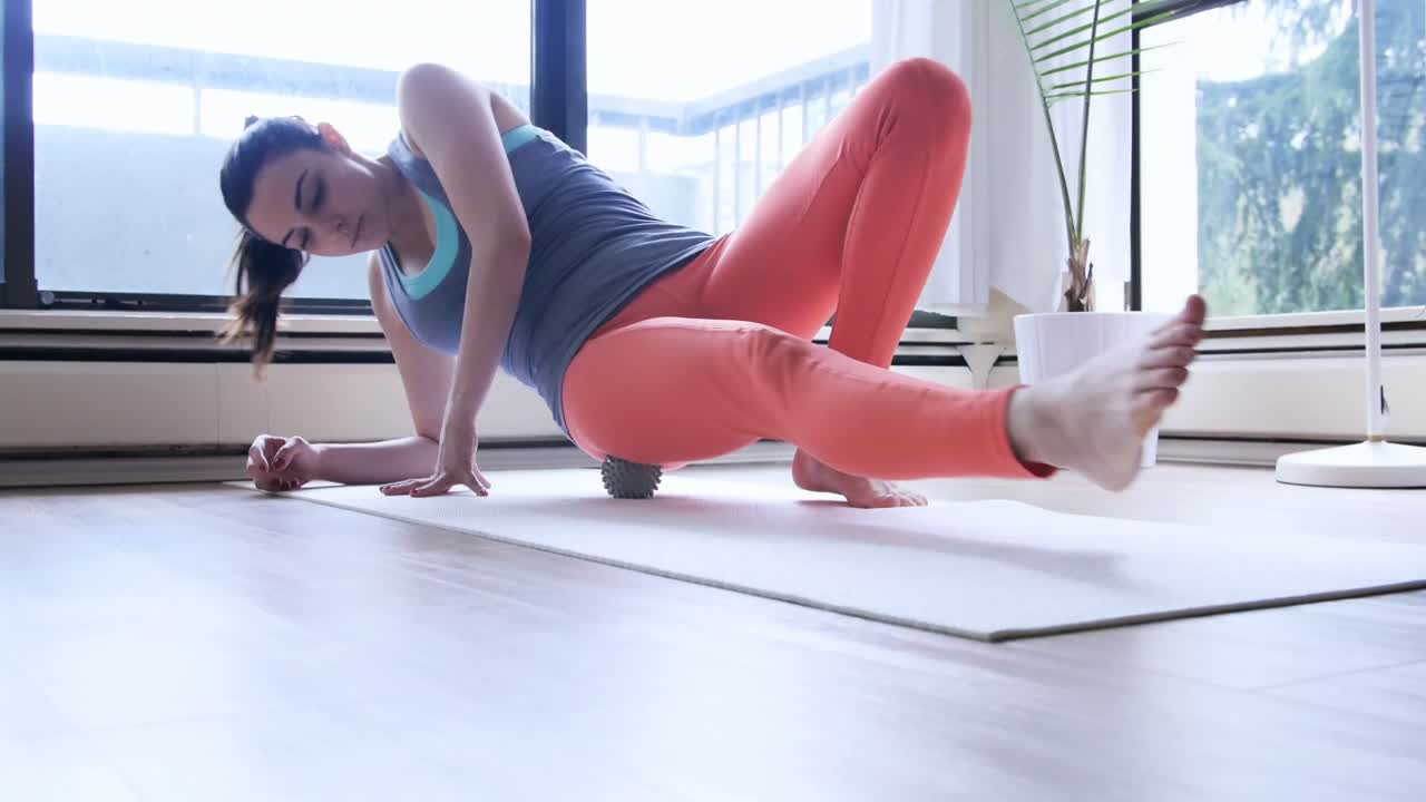 Beautiful woman exercising with stress ball 4k