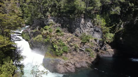 4K-Aerial-orbit-shot-of-lovely-peaceful-waterfalls-in-jungle-forest-of-Patagonia