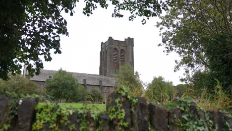 Medieval-Building-and-Tower-in-Landscape-of-Isle-of-Man-Near-Douglas-Town