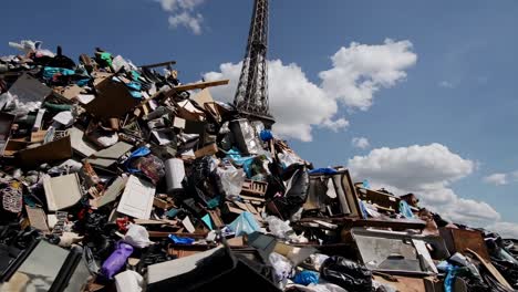 garbage pile in front of the eiffel tower