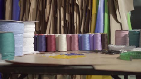 workplace of a tailor in the studio atelier close up