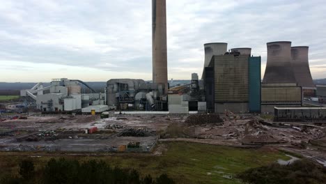 fiddlers ferry power station aerial view across the wreckage of demolished cooling towers explosion and disused factory remains