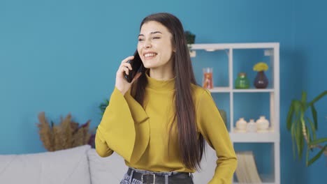 happy young woman talking on the phone, smiling, white teeth and big passengers.