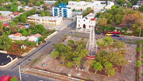 aerial view showing clock tower and church of san fernando in montecristi during sunny day