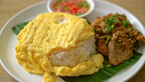 egg-on-topped-rice-with-grilled-pork-and-spicy-sauce