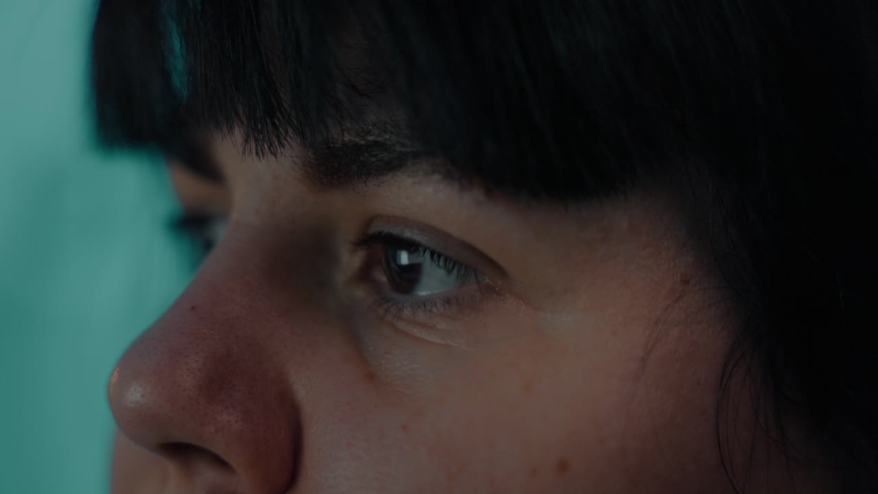 Close Up Of A Woman's Eyes Looking At The Computer Screen.
