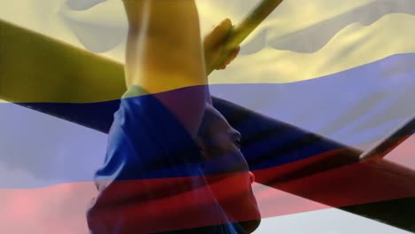 Animación-De-La-Bandera-De-Colombia-Sobre-Un-Hombre-Musculoso-Y-Fuerte-Haciendo-Flexiones.