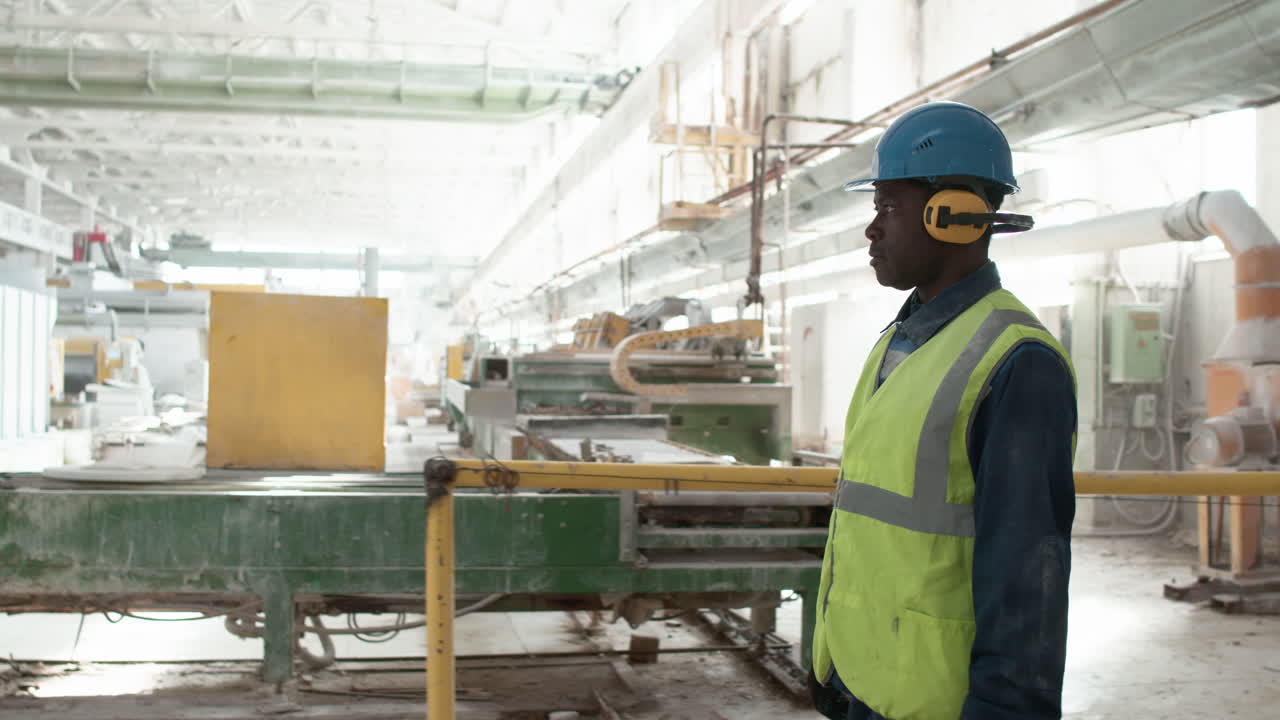 Man walking in a marble factory