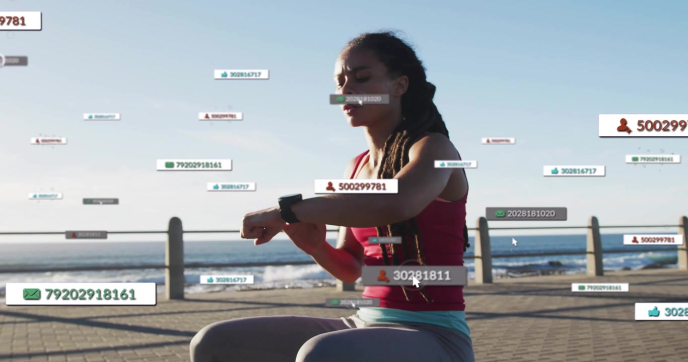 Female athlete tapping smartwatch on seaside ledge, generating fitness overlays tracking heart rate