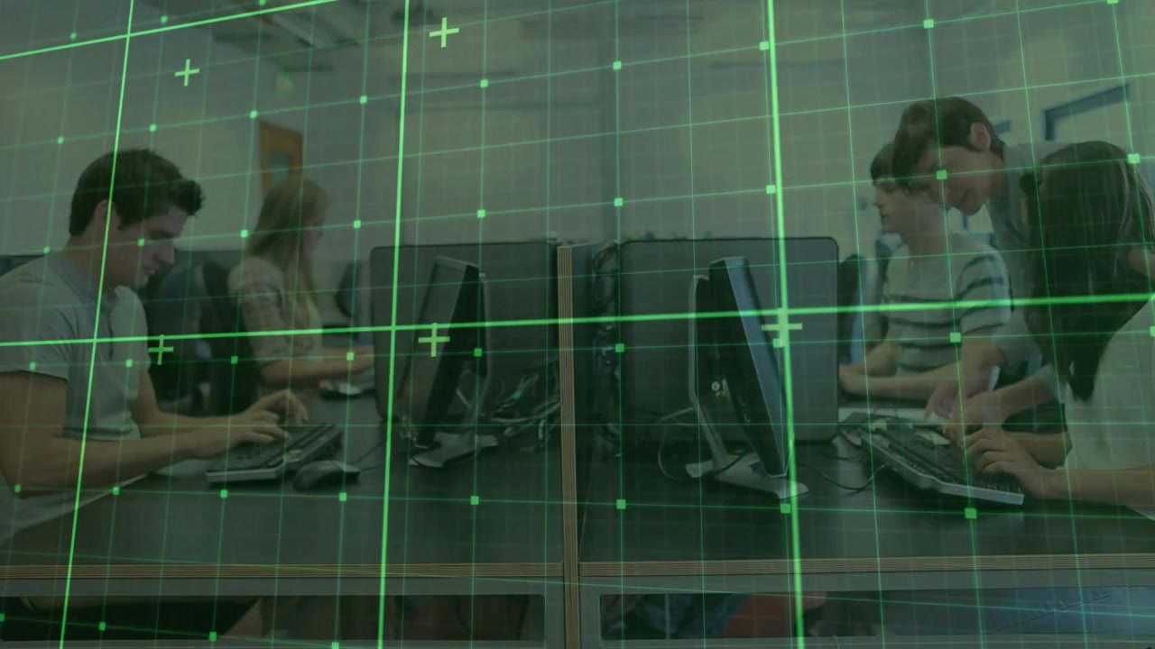 students typing at lab workstations, instructor entering tapping tablet guiding overlay grid effect