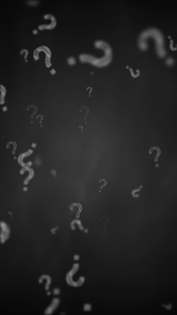 Flying question mark written chalk on blackboard. Quiz white chalk on black chalkboard. Hand drawn icon. Loop animation. Vertical video.