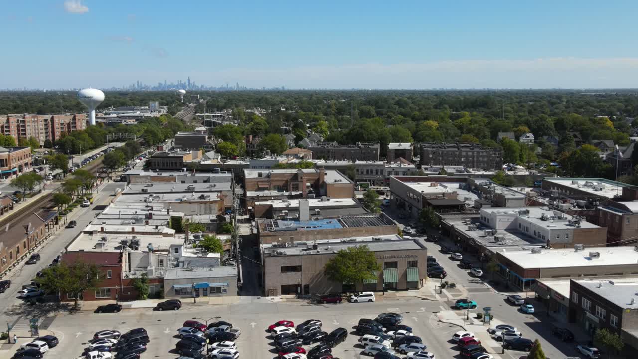 La Grange, IL on a sunny fall day, showcasing streets, buildings, and the suburban landscape With Downtown Chicago in Background. Orbit Right Zoom Day E
