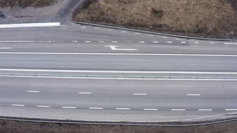 top down drone shot of highway in sweden