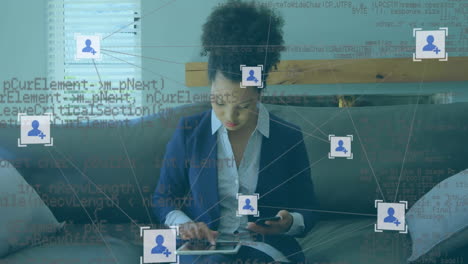 web of connections icons and data processing against woman using digital tablet and smartphone