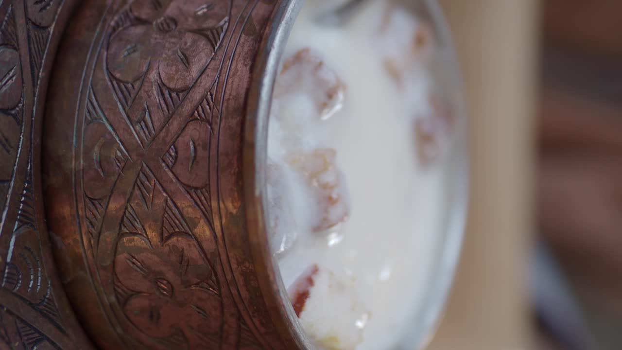 Turkish Dessert Sütlaç in a Copper Bowl