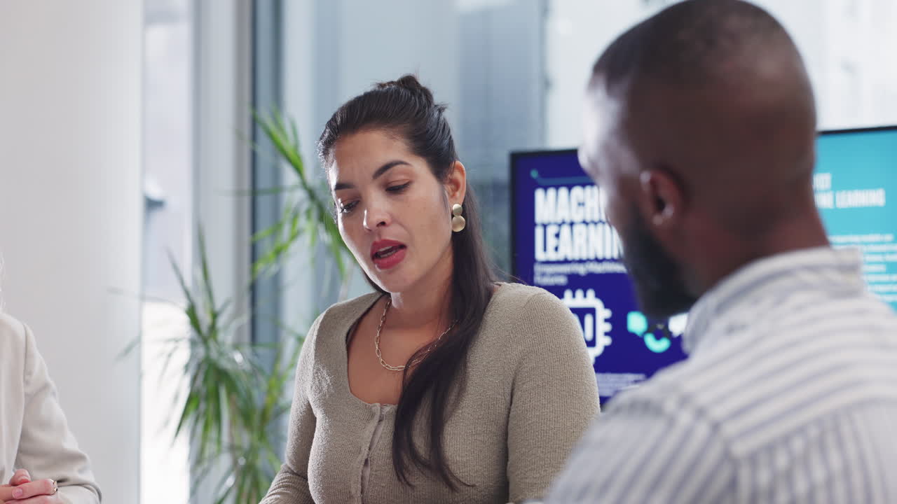 Business meeting discussing machine learning and AI
