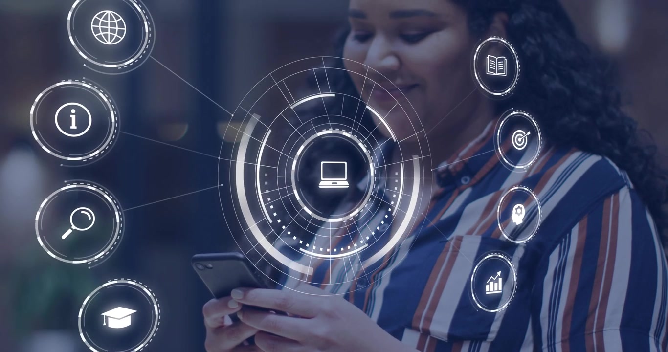 Mid-adult woman tapping smartphone icons and swiping phone animating holographic tech UI in office