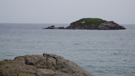 hon lao island peak of mui ne and rocky coastline, static view