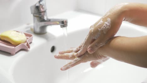 Concept-of-health-cleaning-and-preventing-from-Coronavirus-or-COVID-19-pandemic-prevention-wash-hands-with-soap-and-warm-water-rubbing-fingers-washing-frequently-or-using-hand-sanitizer-gel