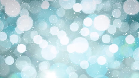 nieve cayendo con círculos de navidad de luz bokeh