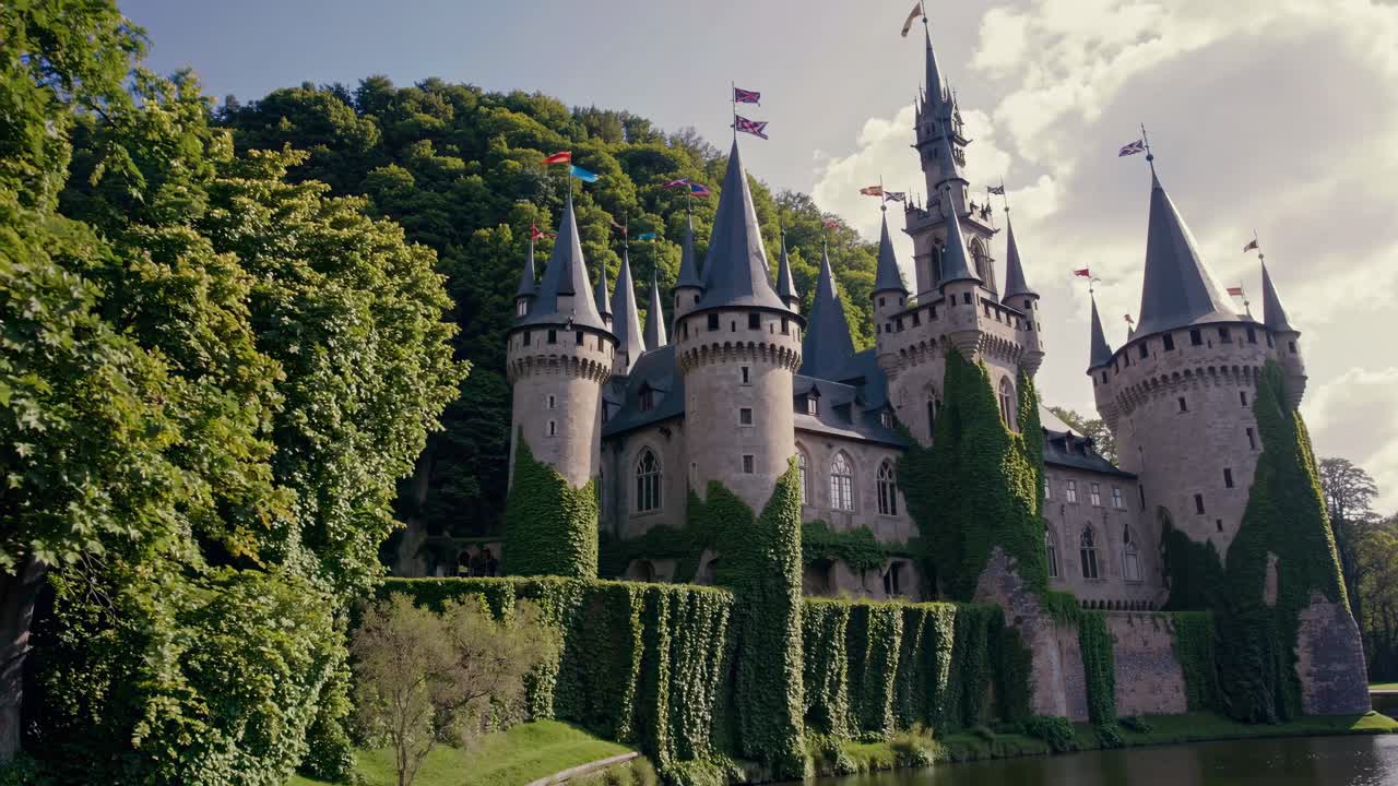 A majestic castle covered in ivy, captured from a low-angle, creating a fairytale ambiance