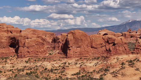 Beautiful-panoramic-view-of-Arches-National-Park-with-snowy-Mt