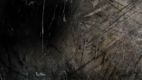 animation of moving scratches and cracks over dark background