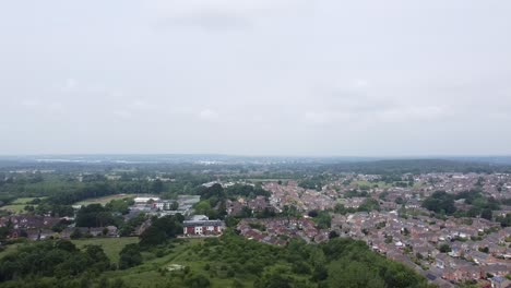 Tripod-shot-from-a-hill-looking-down-at-all-of-the-close-houses-in-cornwall,-england