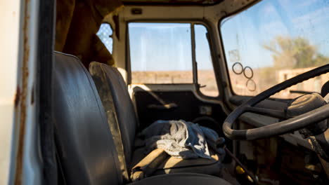 a time-lapse motion shot of the interior of an old abandoned truck