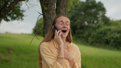 woman talking on the phone and being excited and happy