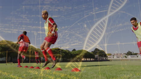 dna strand and scientific data animation over soccer players training on field