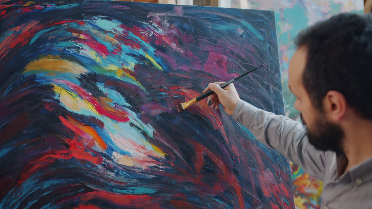 Artist Painting Abstract Art in Studio