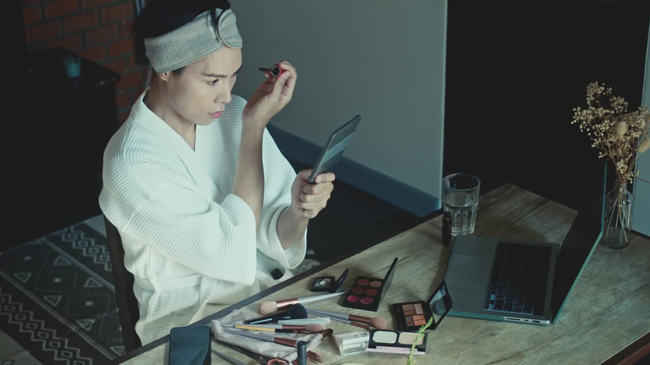 Woman Applying Makeup at Home