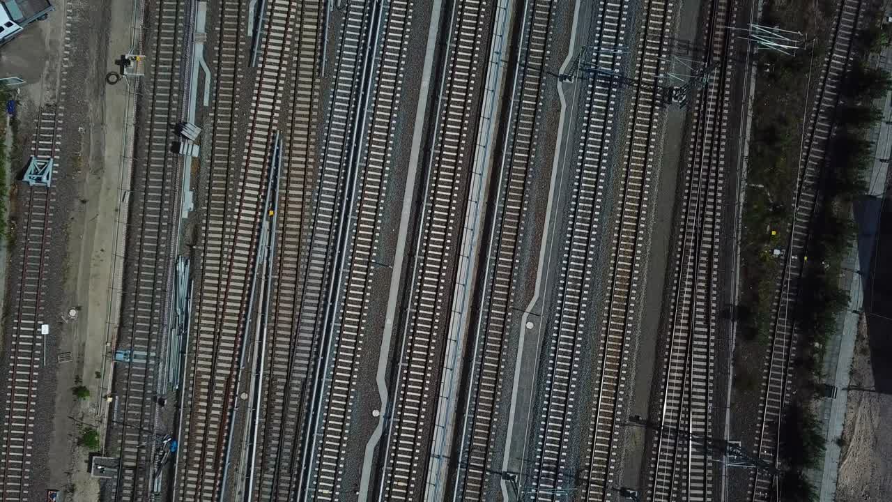 Psychedelic and Dynamic Shot of Train Tracks of a Big Metropolitan Metro System in Large European City. 4K without wagons passing by, shot during sunrise.