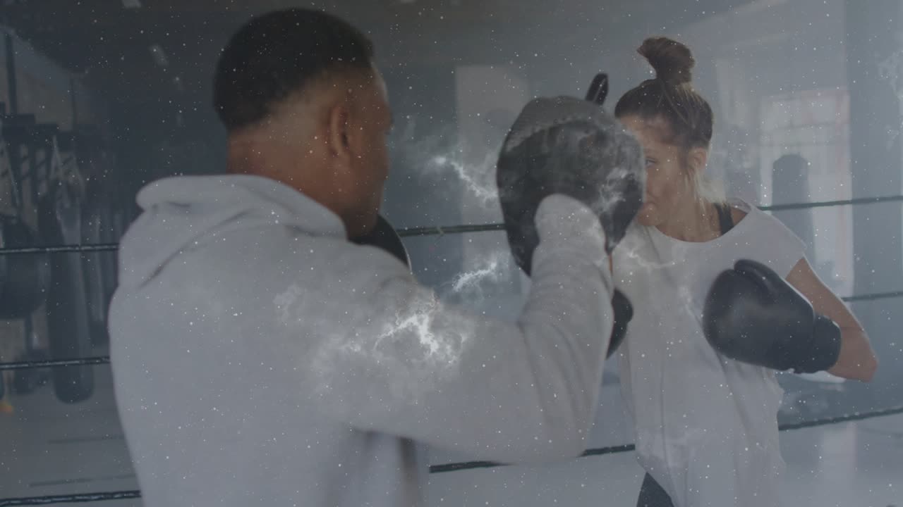 Coach raising focus mitts, boxer throwing jabs and slipping, boxing training, nebula overlay moving