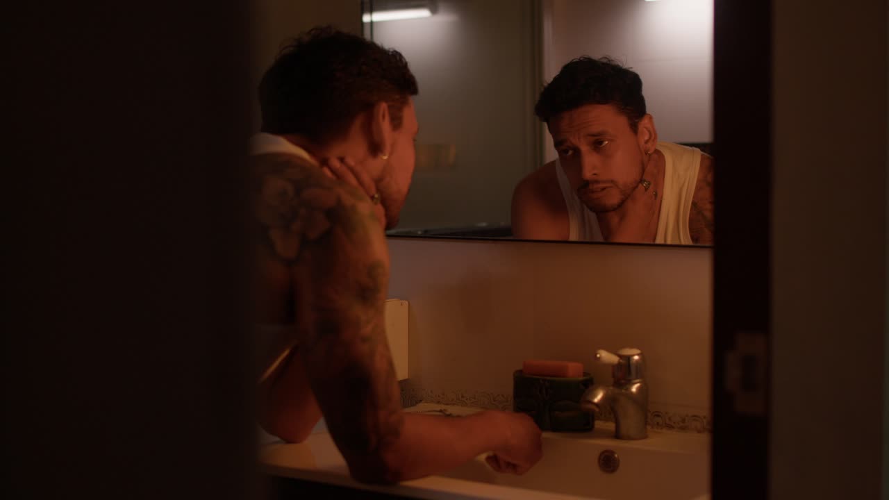 Man in Bathroom Mirror