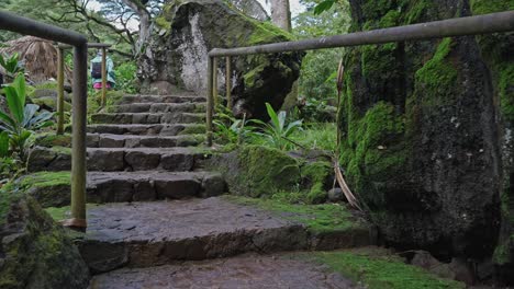 a pov shot of a person climbing up some stairs